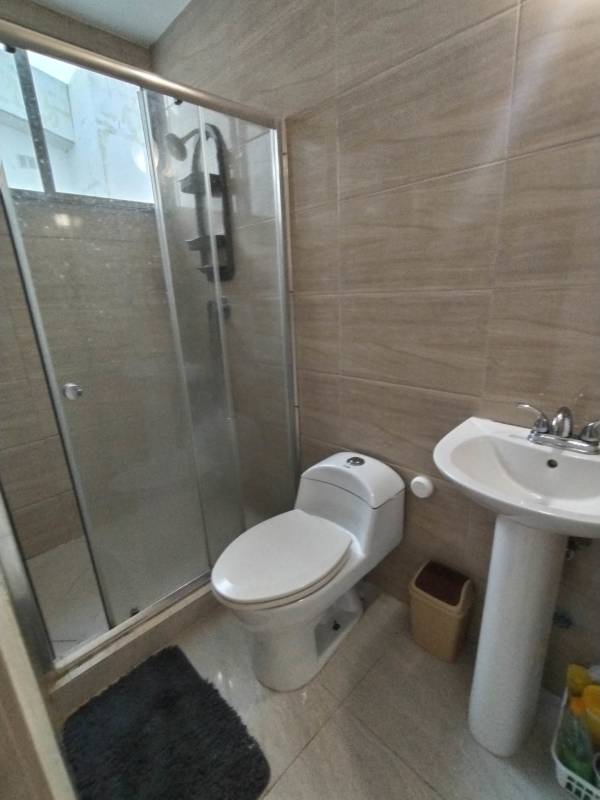 Adult and kids swimming pool with landscaped gardens in PH Terrazas de Balmoral Pedregal Panama City