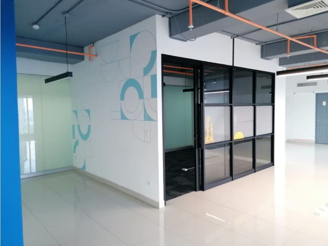 Reception area with waiting space and glass wall in PH BICSA Financial Center