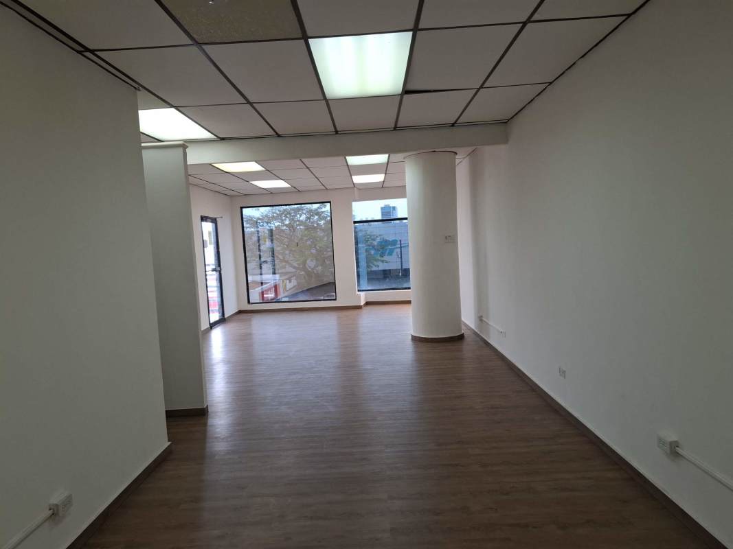 Empty renovated open-plan office with large windows in Villa de las Fuentes Panama