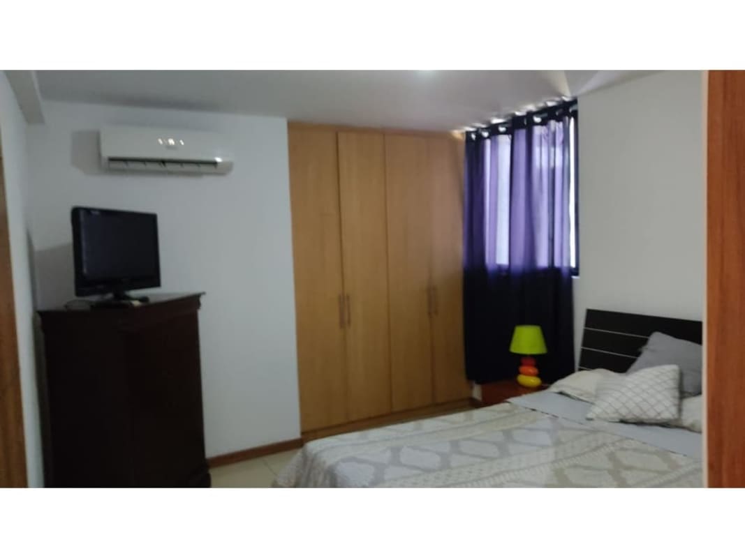 Bedroom with closet, air conditioner and TV dresser Terrazas del Rey Panama City