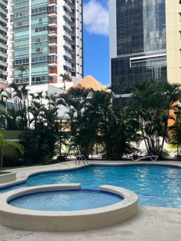 Modern living room with accent wall, recessed lighting and contemporary furniture at PH Green Bay Costa del Este Panama