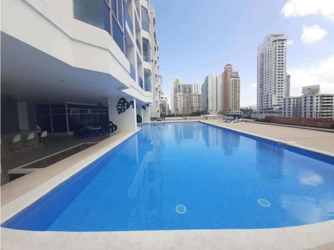 Luxury apartment building with swimming pool overlooking city skyline in San Francisco Panama