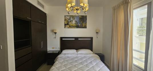 Modern kitchen with granite countertops and stainless steel appliances in Tuscan Country Club Panama Pacifico