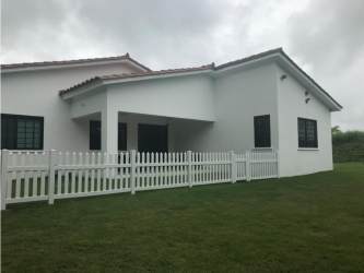 Covered terrace patio opening to garden lawn home rental Hacienda Pacifica Panama