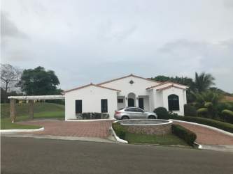 Single-family house with white stucco and terracotta roof Hacienda Pacifica San Carlos Panama