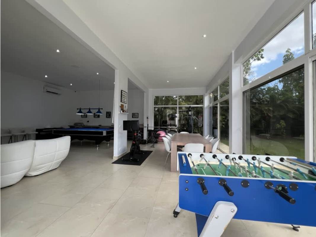 Luxury master bedroom with ensuite bathroom and balcony in Fairways Estates Santa María