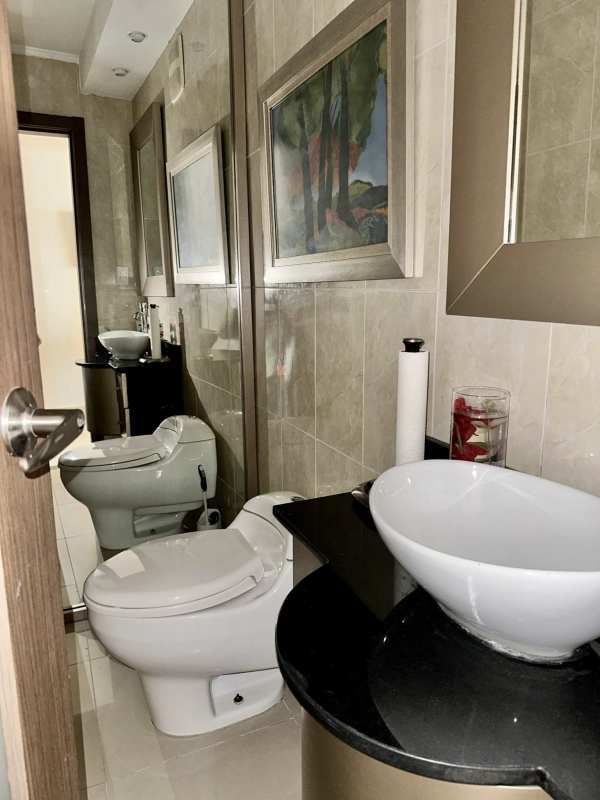 Closed kitchen with granite countertops and appliances at PH Sophia Tower Obarrio Panama