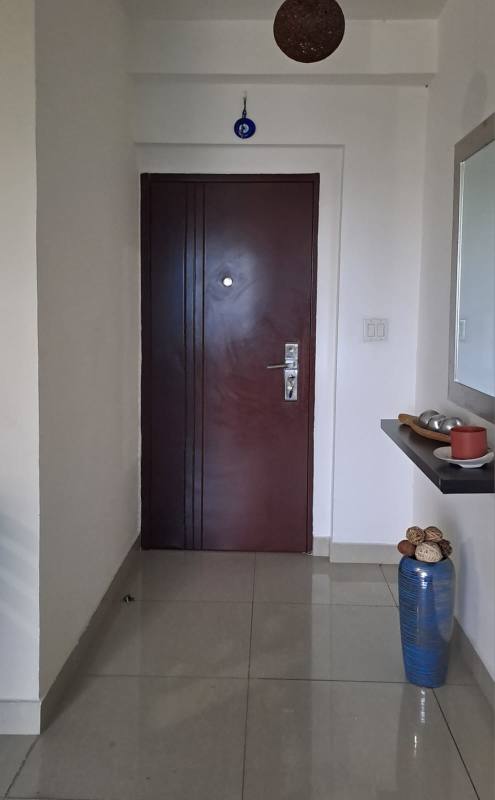 Formal dining area with glass table and panoramic Obarrio views in PH Sophia Tower Panama