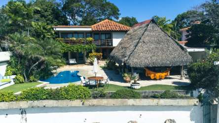 Spacious shaded terrace with tropical palapa lounge oceanfront in Coronado Panama