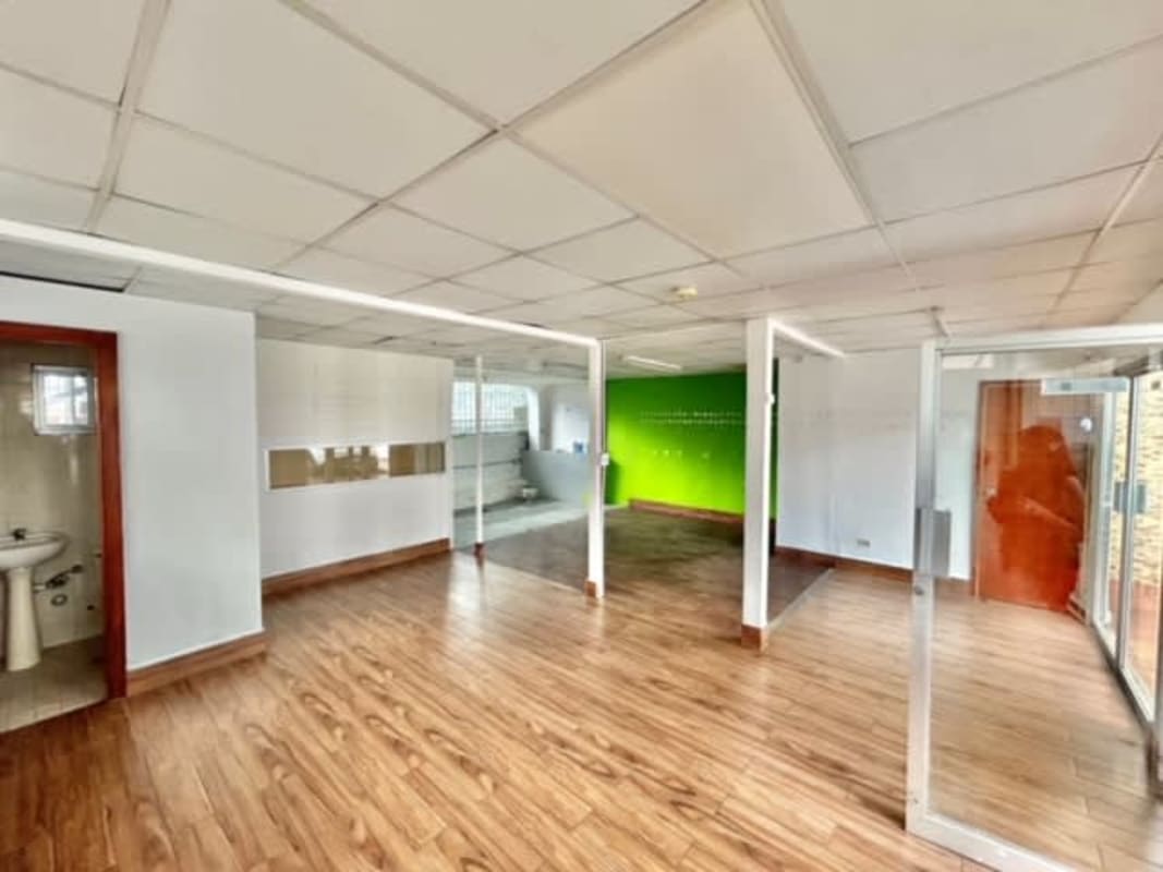 Commercial hallway with elevator access tiled lobby in PH Plaza Nicoya San Francisco Panama