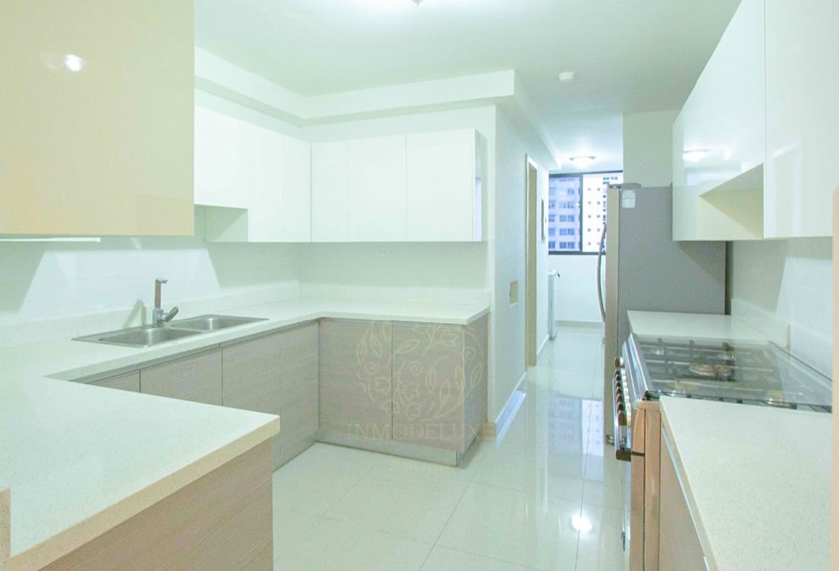 Spacious kitchen with modern cabinetry and countertops in PH Balboa Bay Avenida Balboa Panama City