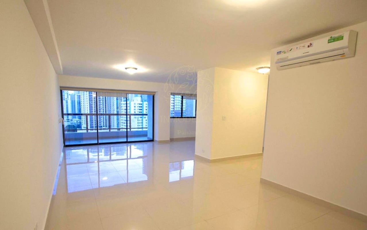 Open living dining room in Balboa Bay condo Avenida Balboa Panama City with tile floors