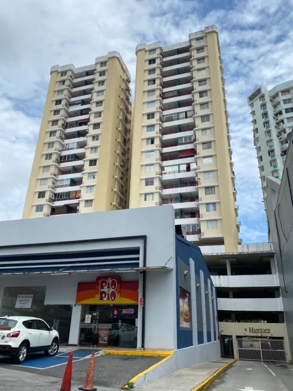 Exterior facade of PH El Marquez twin towers with balconies over retail space Vía España Panama