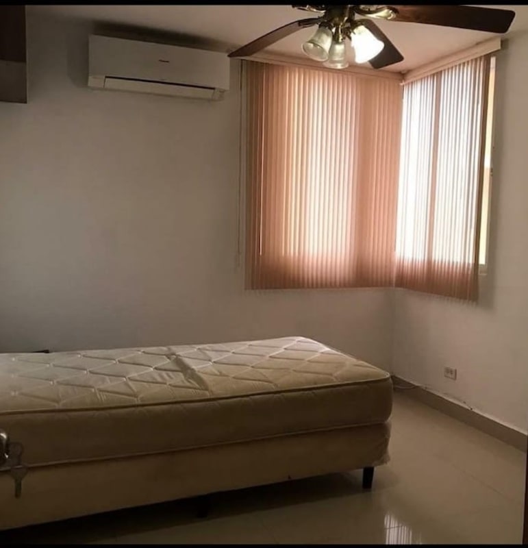 Minimalist bedroom with split air conditioning, ceiling fan, blinds in PH El Marquez Panama City