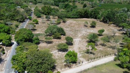 Sunset sky above rural open plot with fence posts and grazing area Las Uvas Panama