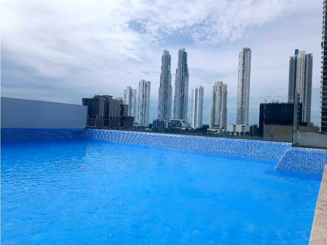 Sky lounge and rooftop infinity pool with city and ocean views at PH Park Lane Costa del Este Panama