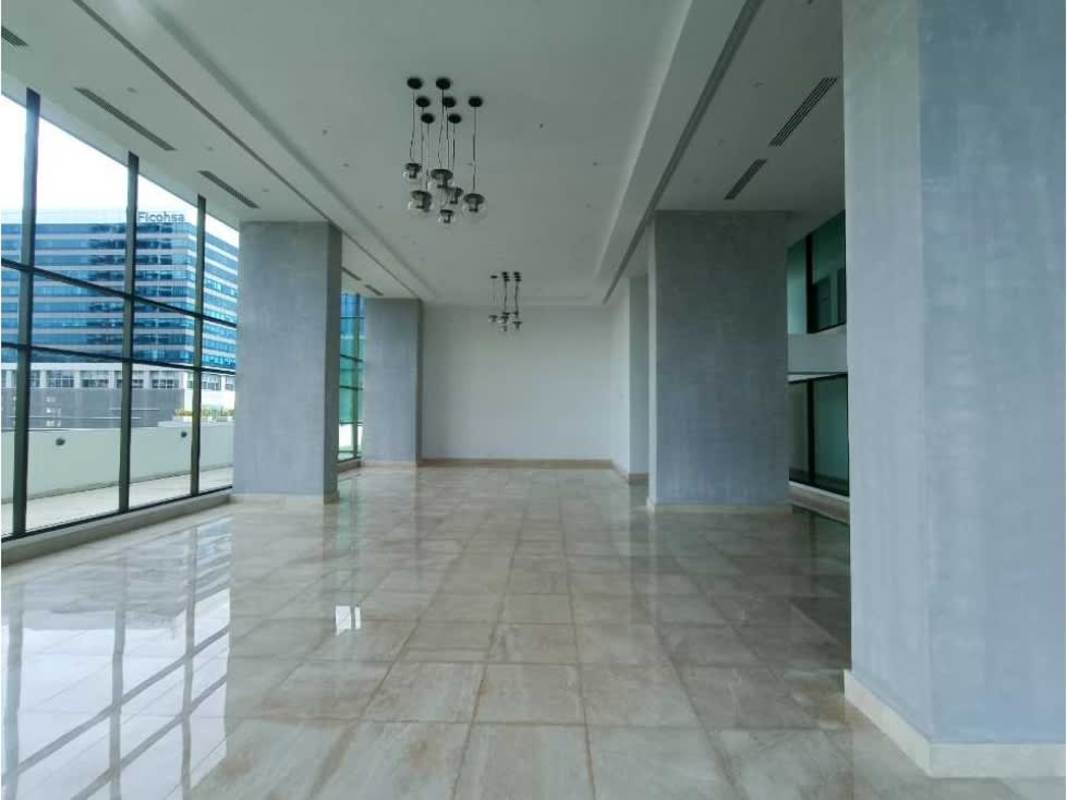 Spacious commercial interior with large windows at PH Park Lane tower Costa del Este