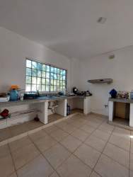 Kitchen with granite countertops and tile floor in townhouse La Chorrera Panama