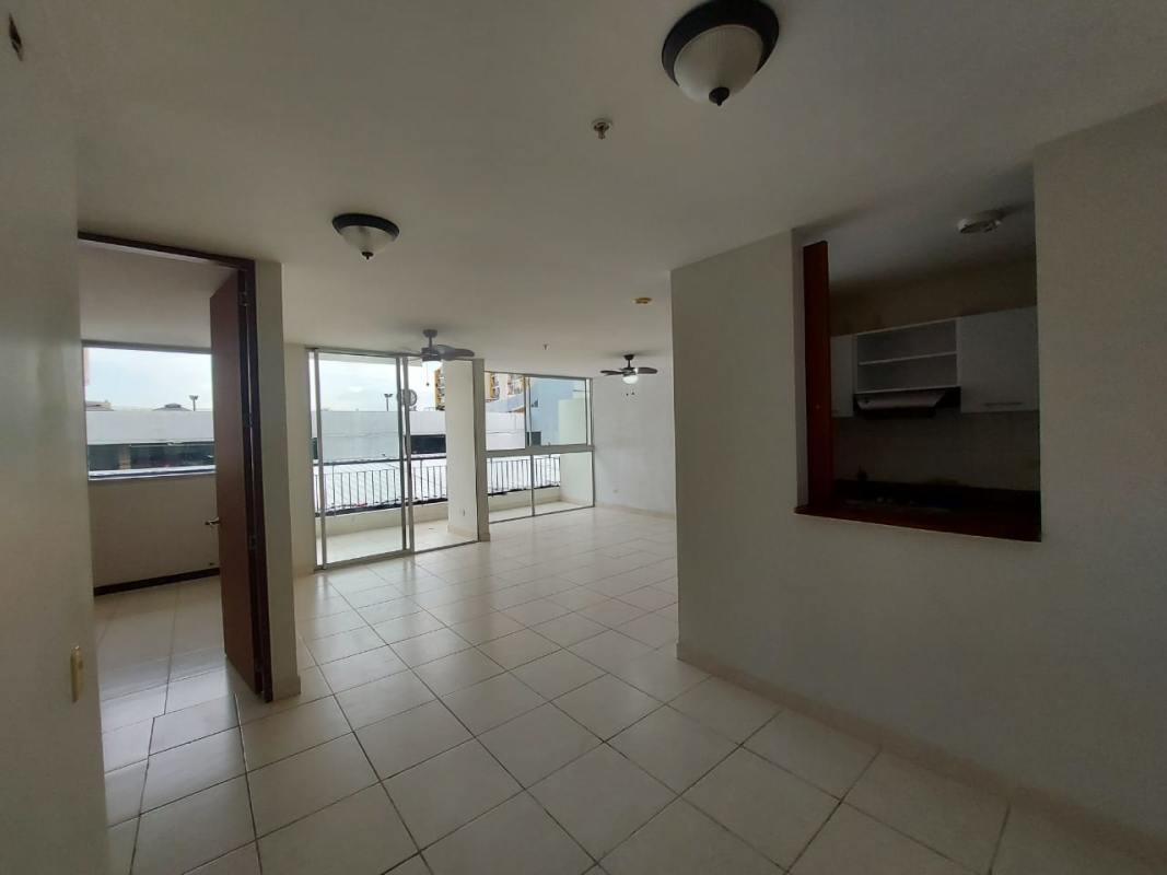 Unfurnished open living dining area with balcony access in PH El Bosque Park Residences Panama