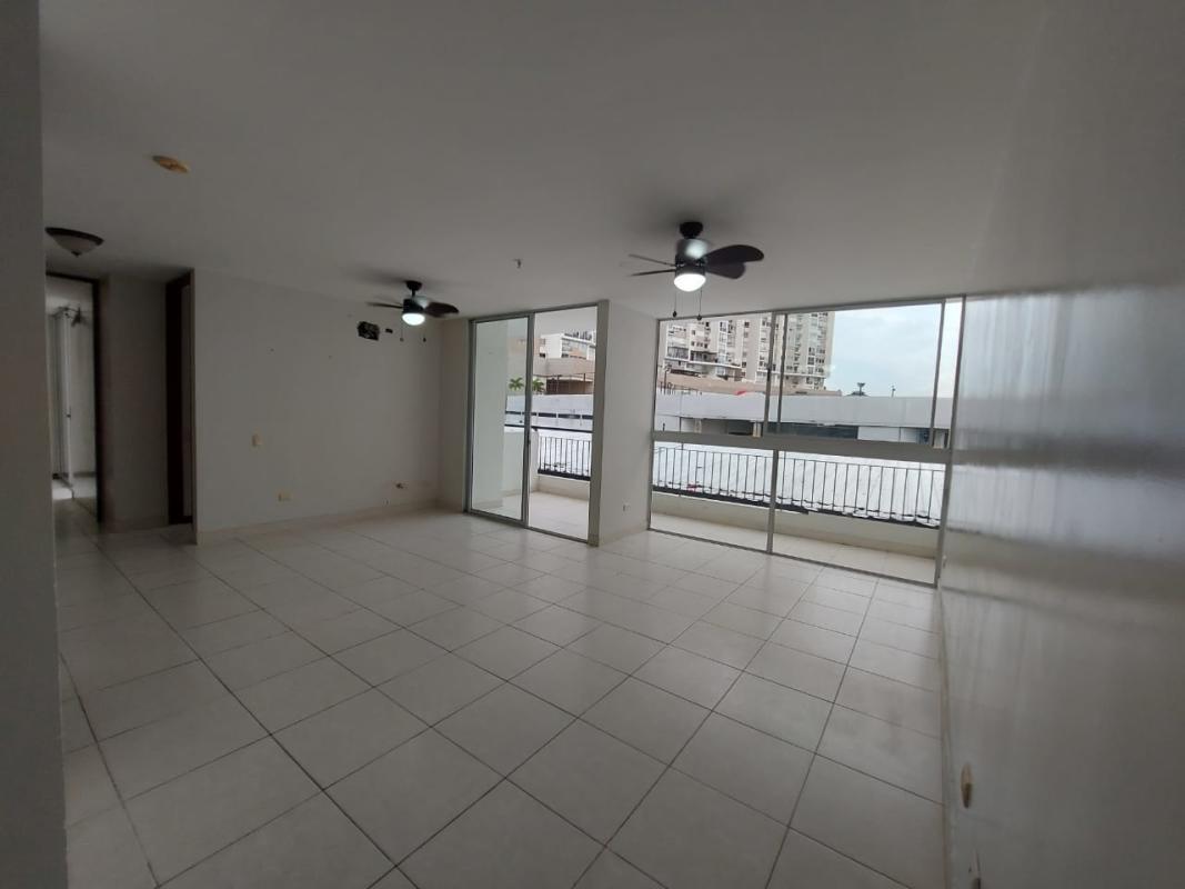Bright bedroom with window and built-in closet in Tumba Muerto furnished apartment Panama City