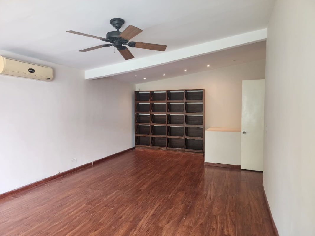 Bedroom in luxury house with wooden flooring and built-in wardrobe in Coco del Mar Panama