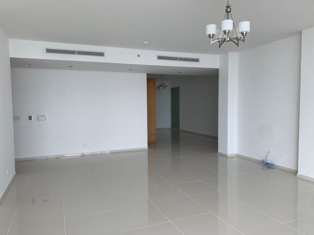 Balcony with glass railing and safety netting overlooking Pacific Ocean PH Altamar Costa del Este Panama