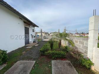 Bedroom with curtains neat tile floor and AC unit La Chorrera Panama