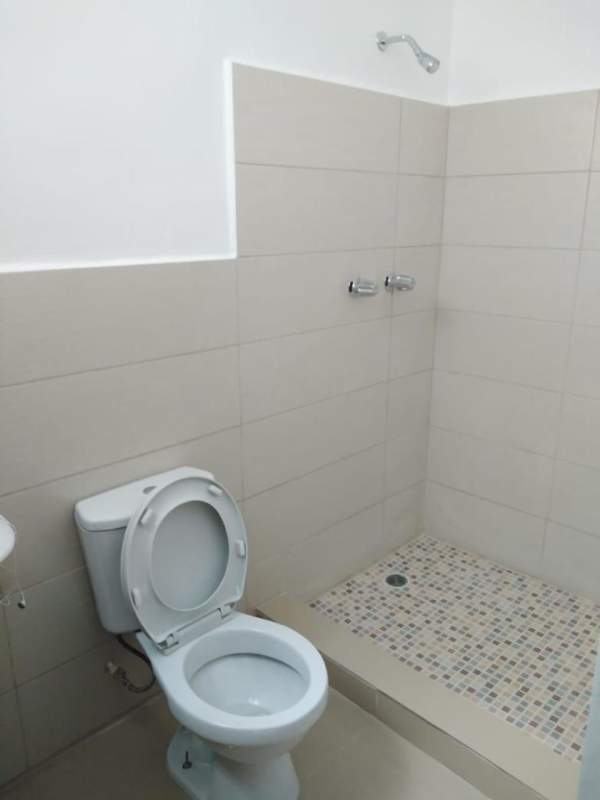 Minimalist bedroom with porcelain floors window PH Moliterno Rio Abajo Panama