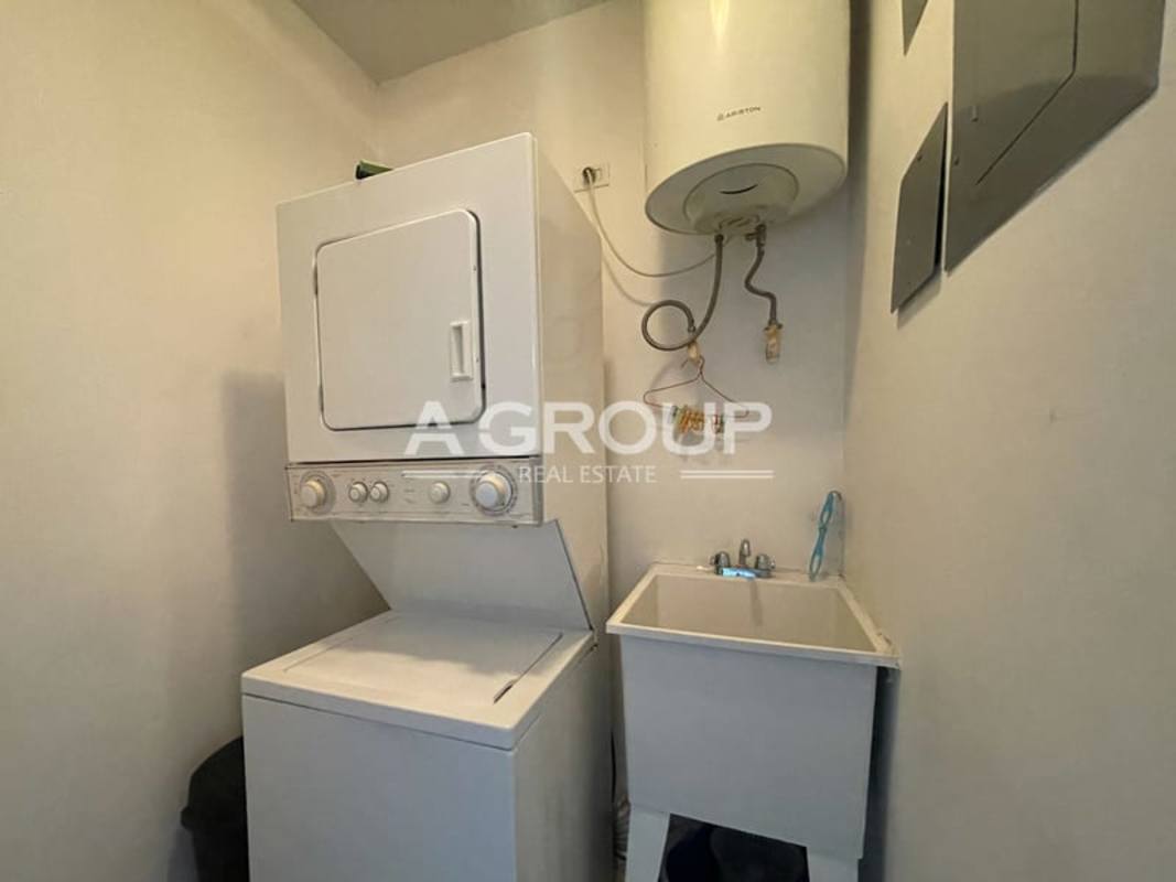In-unit laundry room with washer dryer and heater PH Yacht Club Panama