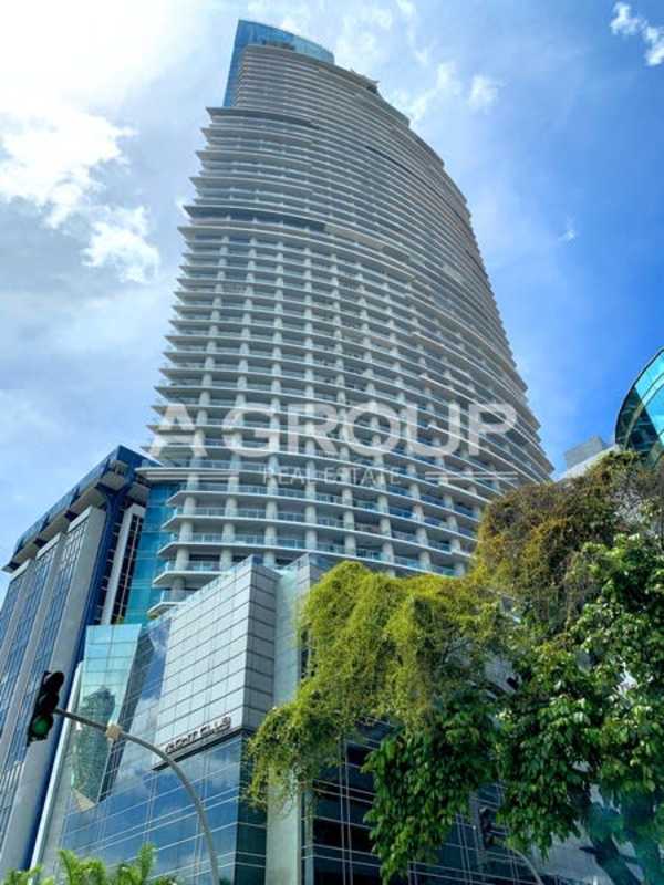 Rooftop infinity swimming pool and deck overlooking city skyline and ocean PH Yacht Club Panama City