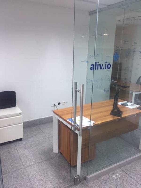 Executive office with glass divider, laminate tile floors, in PH BICSA Tower downtown Panama