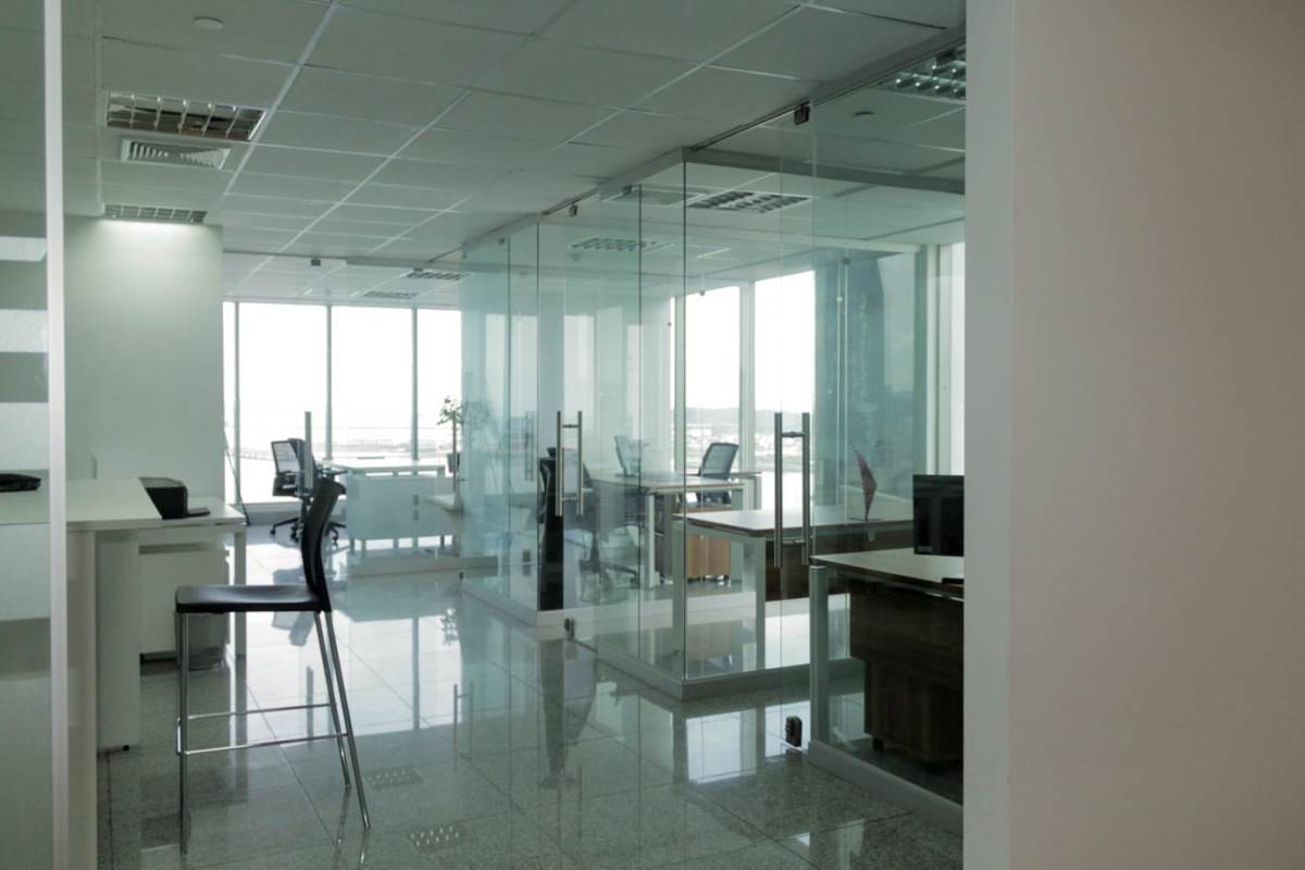Modern corporate office with glass partitions tiled floor PH BICSA Tower