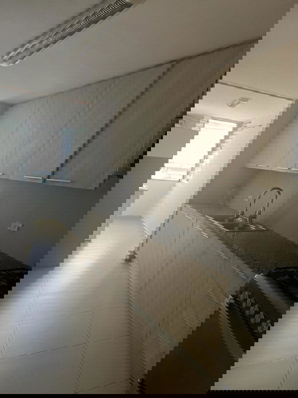 Kitchen with refrigerator, stove and granite counter PH Mar Plaza Panama City