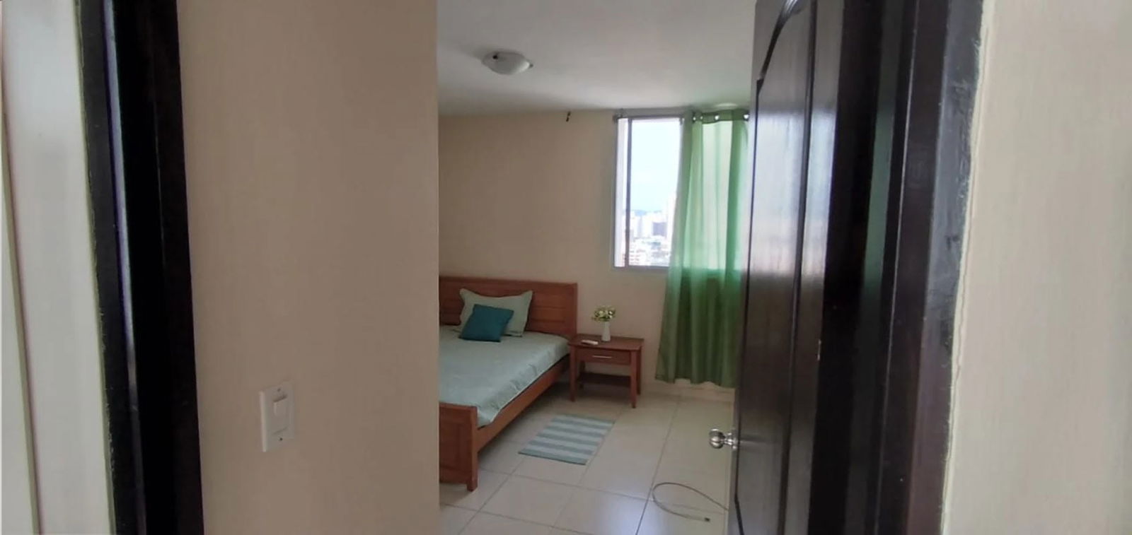 Bedroom with closet, AC and panoramic window overlooking Panama City PH Montenar