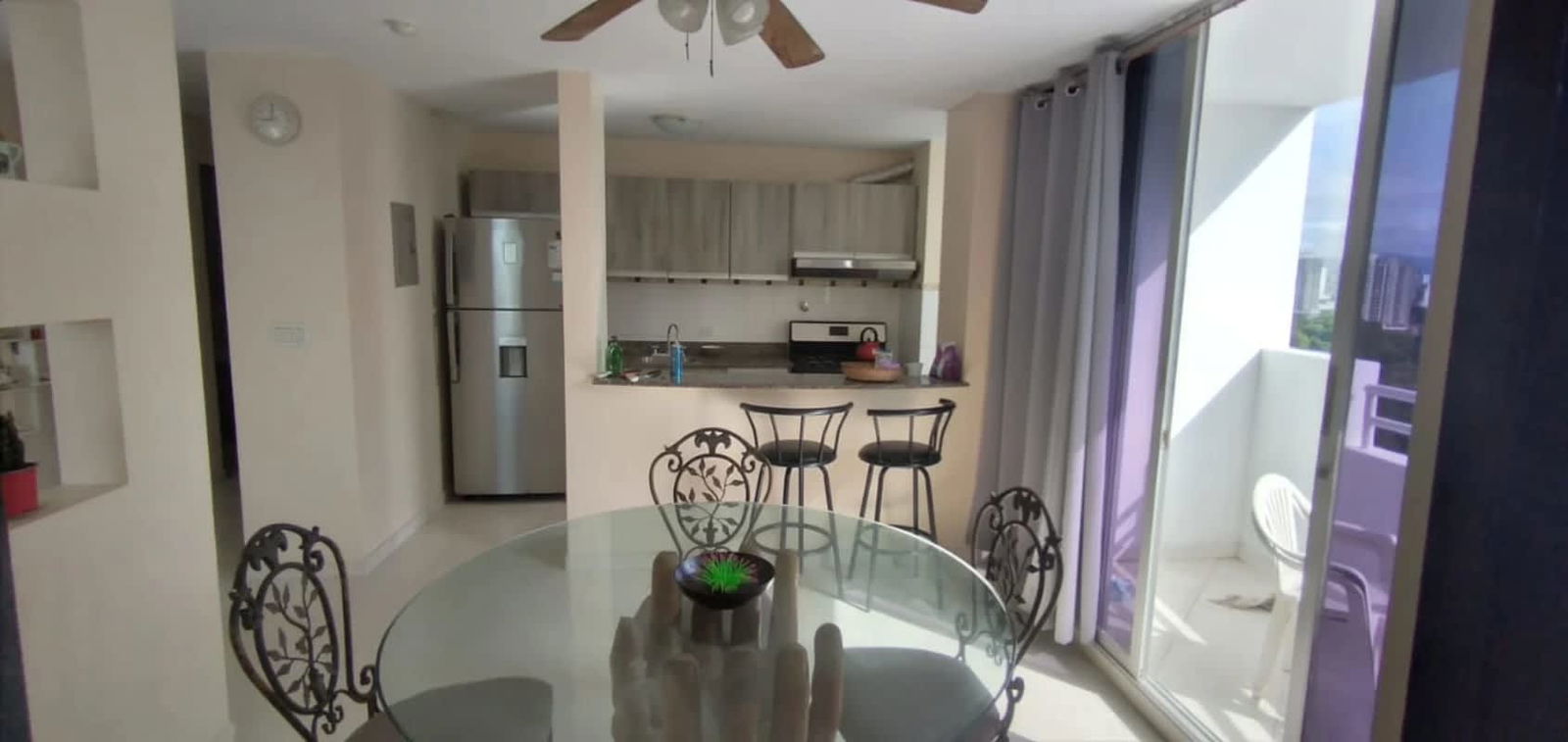 Rooftop swimming pool with sun deck and city skyline view in PH Montenar Via Porras