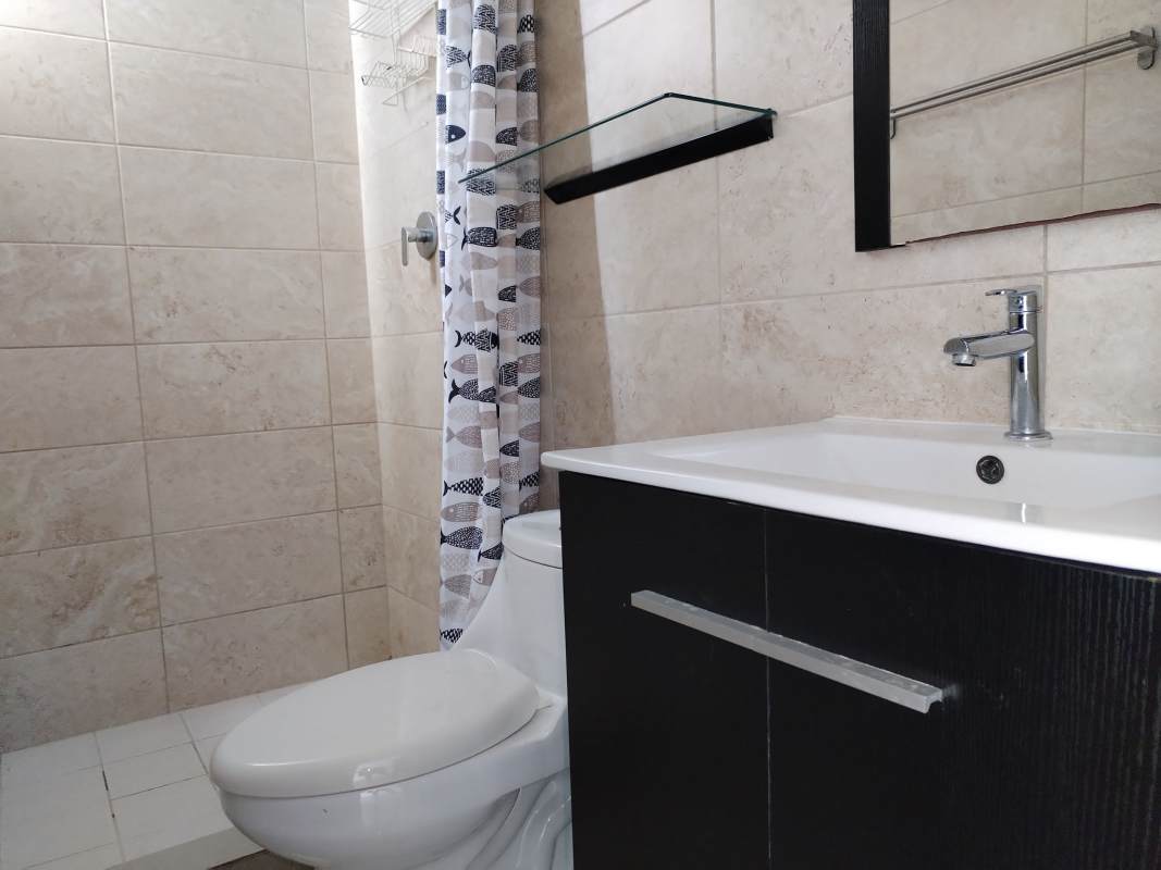 Compact bathroom with modern fixtures, walk-in shower at PH Coral Towers Panama