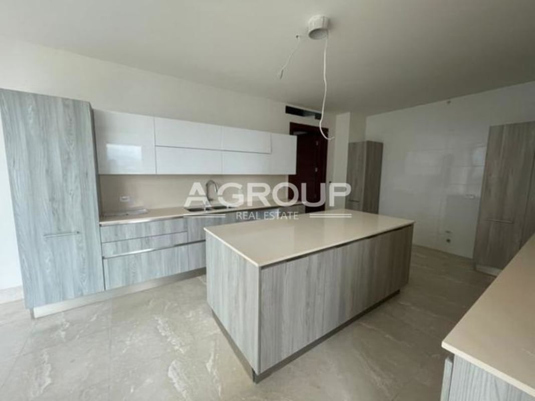 Large luxury kitchen with island marble floors in Santa María Panama