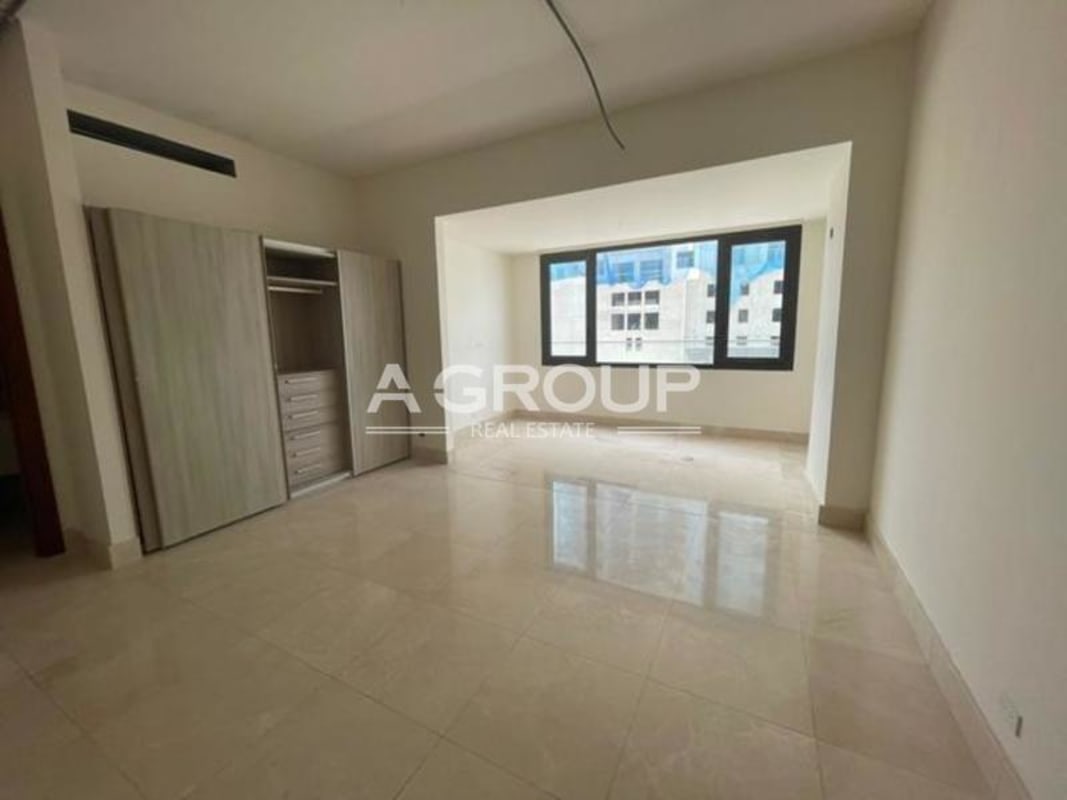 Luxury bedroom with large windows and cityscape views in Santa María Panama