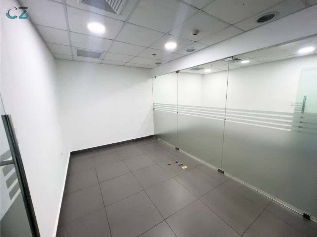 Empty glass-partitioned office room with tile floor in Oceania Business Plaza Panama City