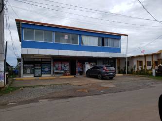 Ground floor retail spaces with parking facing major street in Chitre Panama by Universidad Nacional