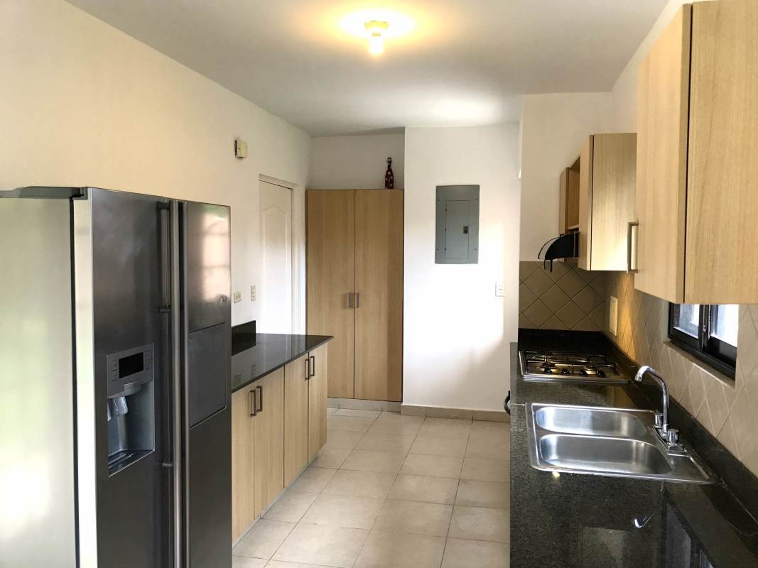 Spacious master bedroom with balcony and bath at Versalles Costa Sur Panama