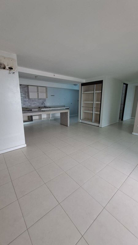Open kitchen with granite countertop and ample storage in PH Miró El Cangrejo Panama City
