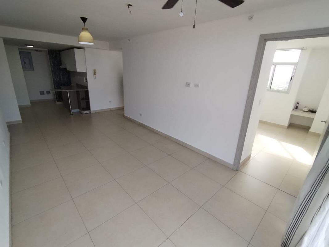 Sleek bathroom with glass enclosed shower, vanity and mirror in PH Riverwalk apartment