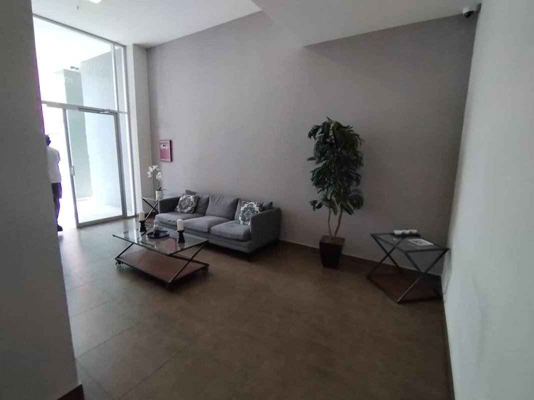 Modern kitchen with granite countertop and tile backsplash in apartment at PH Riverwalk El Crisol Panama