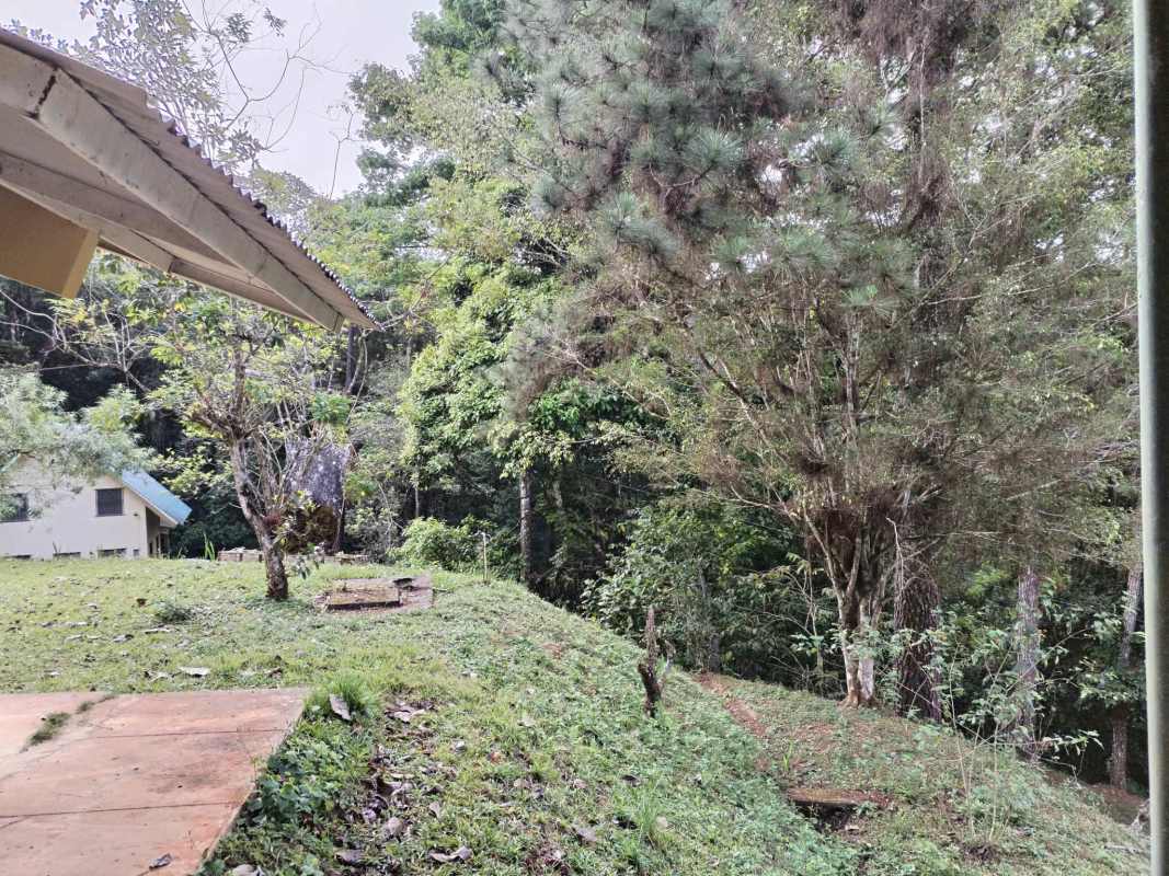 Covered terrace porch overlooking lush gardens mountain retreat house sale Cerro Azul Panama