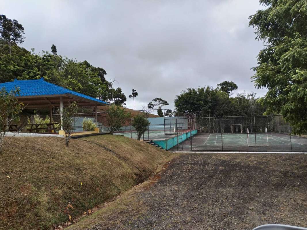 Covered picnic pavilion next to multi-sport court in gated mountain community Cerro Azul Panama