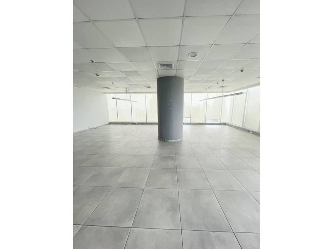 Modern office suite with floor-to-ceiling windows overlooking Panama City in F&F Tower