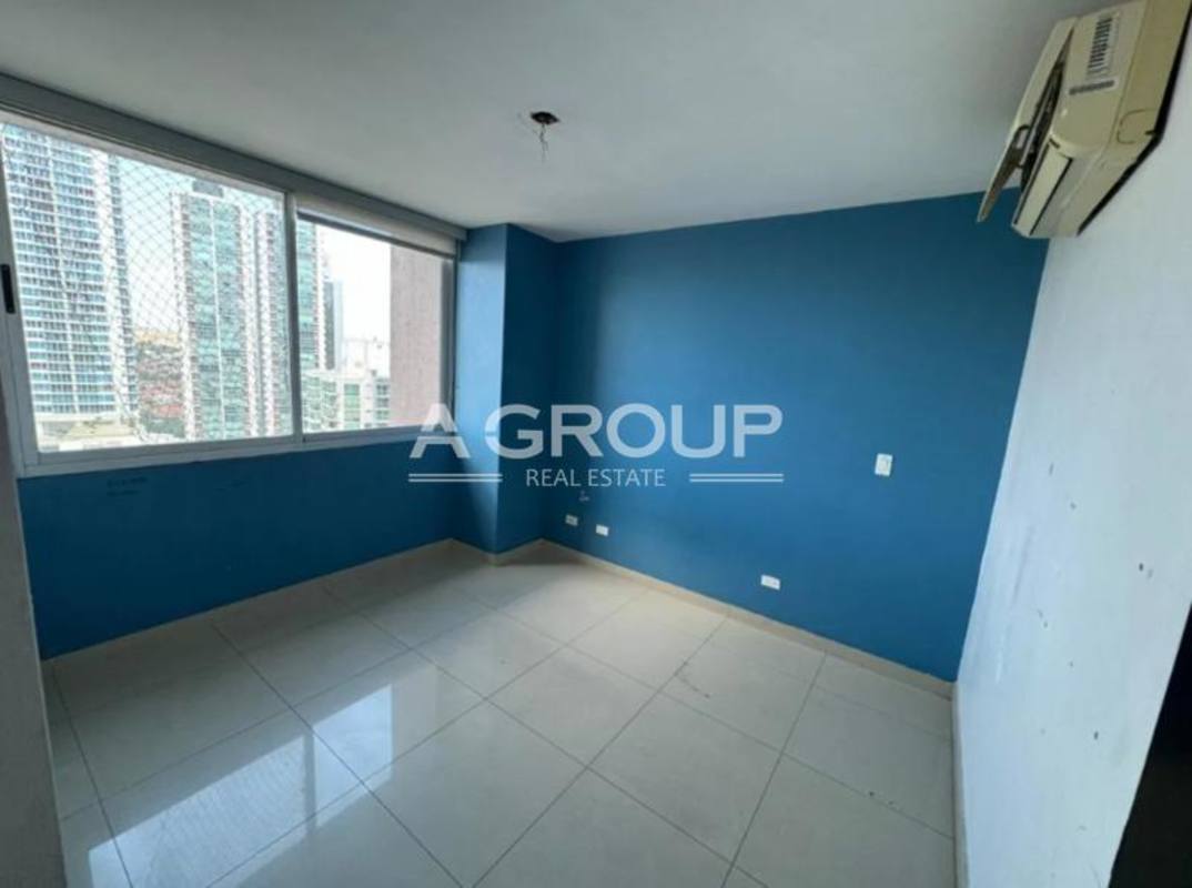 Bedroom with large window, AC and partial ocean view in PH Sevilla Costa del Este Panama