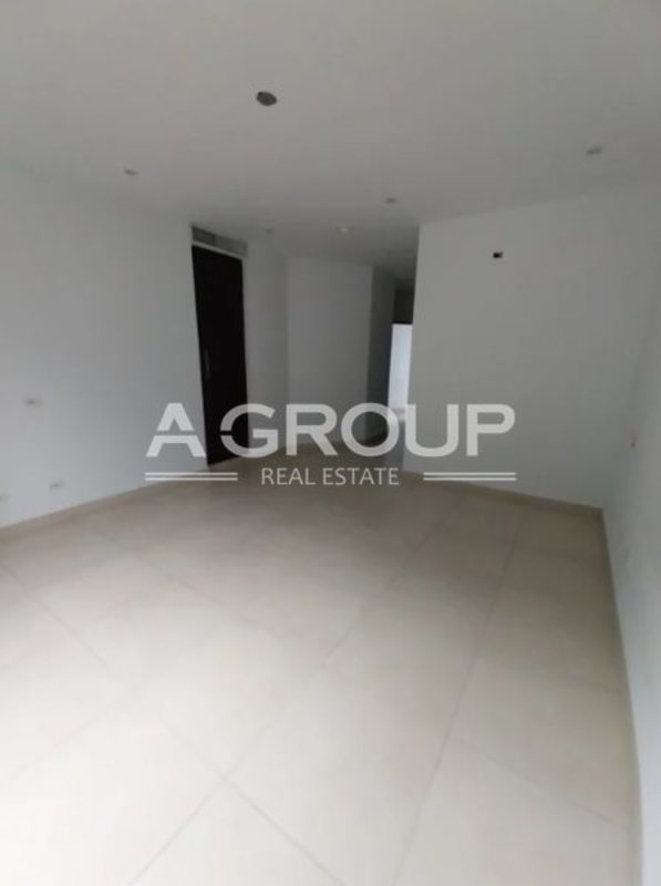 Empty modern room with tile floors recessed lights Embassy Village Panama