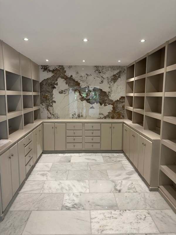 Stylish marble bathroom with glass shower, modern vanity in luxury Panama house Altos del Golf